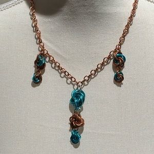 Mobius Copper set earrings, necklace, and bracelet